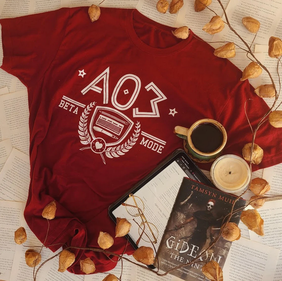 Photo of CollegeBookcore's AO3 shirt in red.